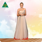 Cardboard cutout of a woman in a beige dress with 'Australian Made' logo in the corner.